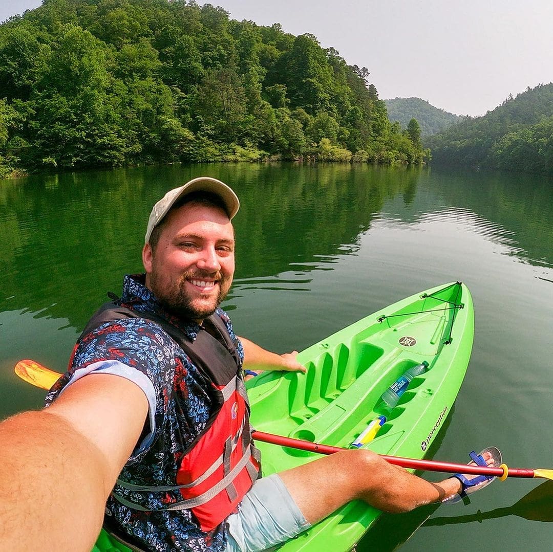 Harrison of NC Eat & Play kayaking through NC lakes and rivers