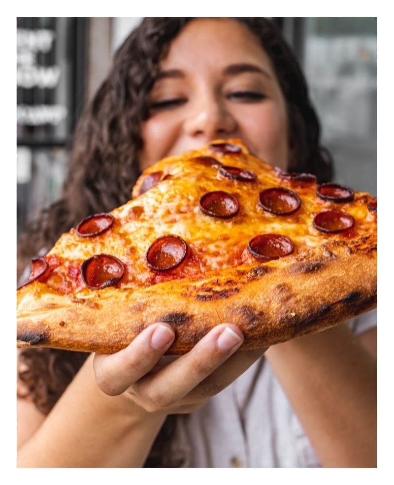 Megan eating pizza Megan eating pizza