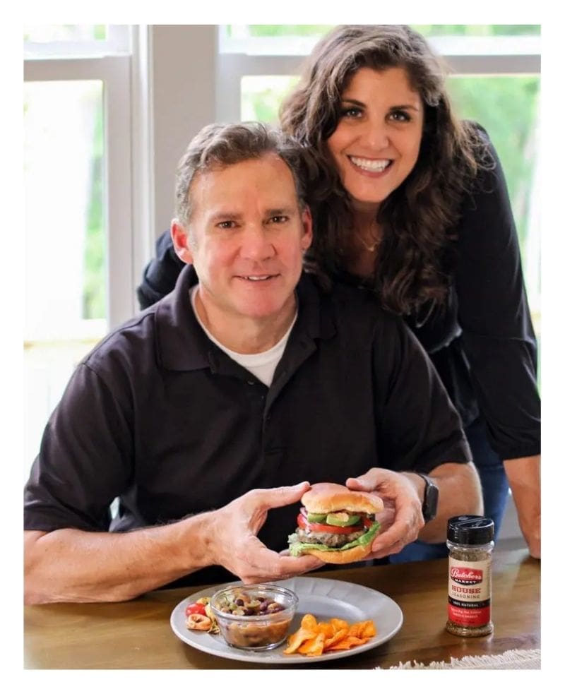 Megan's parents. Dad holding his faorite burger Megan's parents. Dad holding his faorite burger